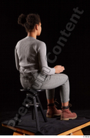  Zahara  1 brown workers dressed grey sweatshirt grey trousers sitting whole body 0012.jpg